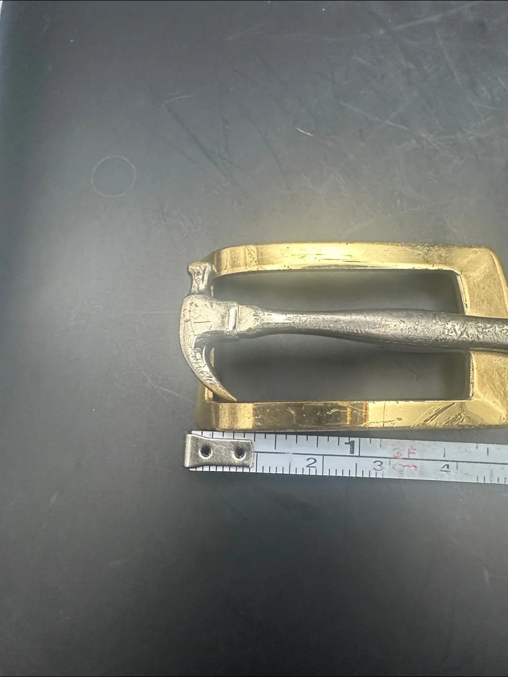 Hammer belt buckle